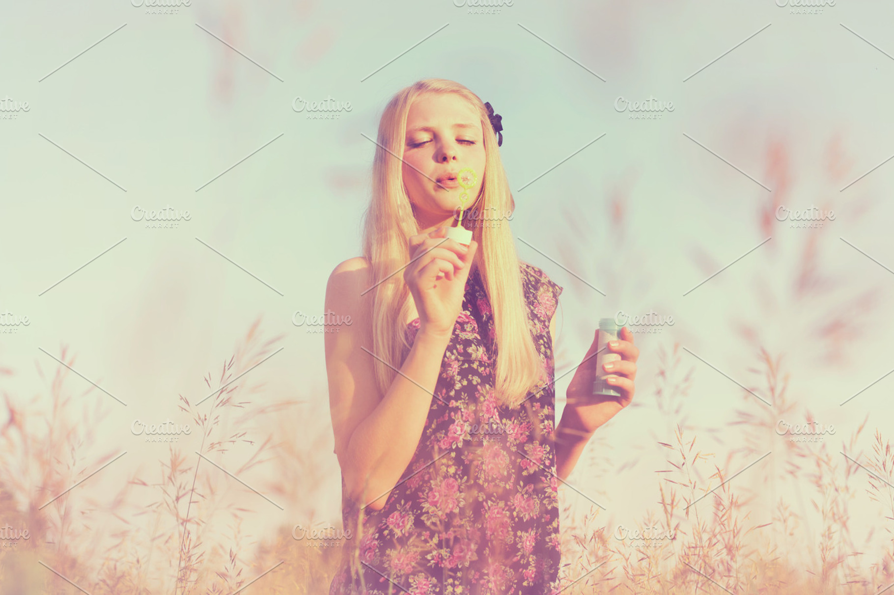 Girl blowing bubbles stock photo containing blonde and blow
