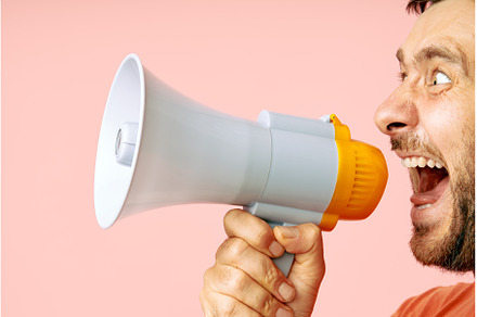 Funny man screaming in megaphone, a Business Photo by Gladkov photography