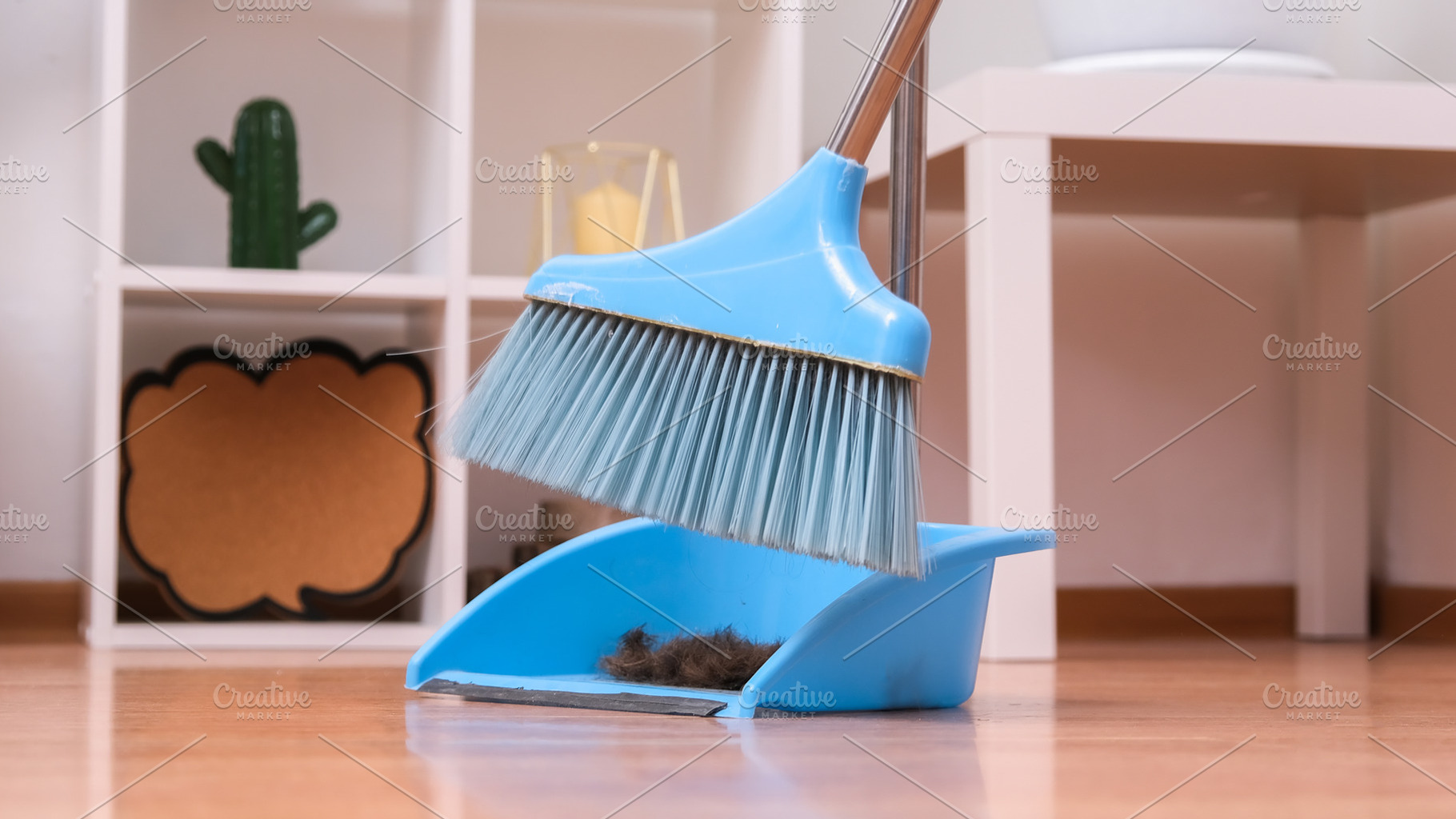 Hair after cutting on the floor. Cleaning hair with a broom in dustpan., a Technology Photo by Detriana
