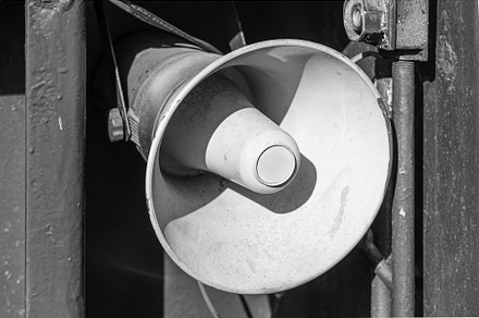 An old Horn loudspeaker is on the gr, an Industrial Photo by Illustrations&photos
