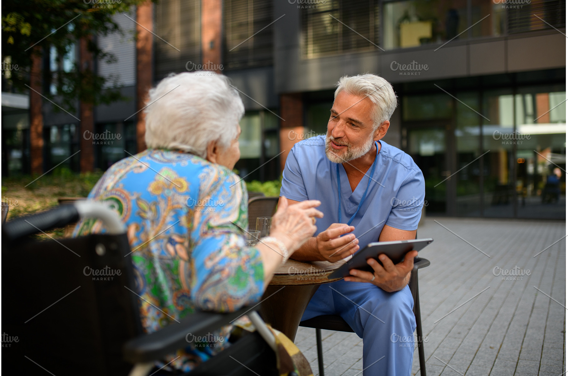 Healthcare professional explaining, a Health & Medical Photo by HalfPoint