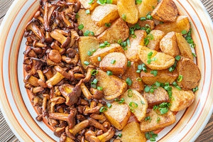 Fried potatoes chanterelle mushrooms, a Food & Drink Photo by Alexander Prokopenko