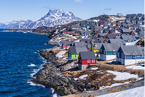 Colorful homes along coastline of, an Architecture Photo by Backyard Stock