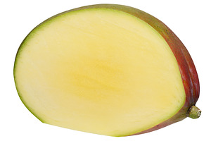 Half of a ripe mango on an isolated background, a Food & Drink Photo by ndanko