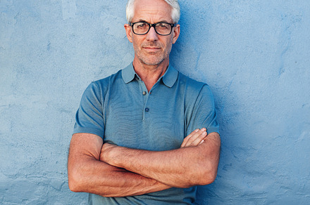 Confident mature man standing stock photo containing adult and alone, a Person Photo by Jacob Lund