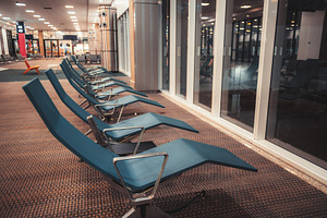 Empty airport lounge seats, an Architecture Photo by SkyNext