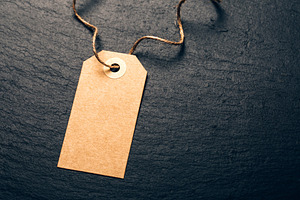 Blank kraft paper tag on twine, a Business Photo by Anna Efetova
