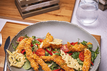 Delicious breaded chicken strips, a Photo by Grafvision photography