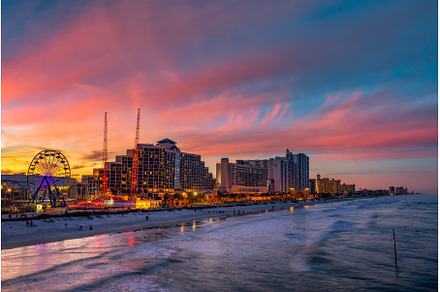Colorful sunset above Daytona Beach, an Architecture Photo by Nick Fox