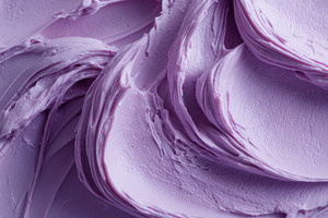 Purple frosting swirls on a cake, a Photo by Beautiful things