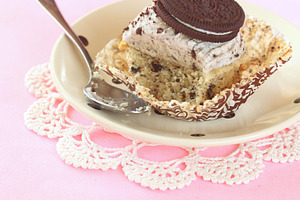 Chocolate cookie cupcake featuring background, baked, and baking