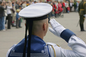 Soldier saluting at military parade, a Person Photo by BOOCYS