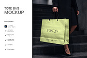 Paper Shopping Bag Mockup with Model, a Packaging Mockup by graphypix (Thumbnail 2 of 4)