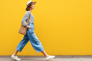 Stylish young woman in hat, striped, a Person Photo by MistyDay