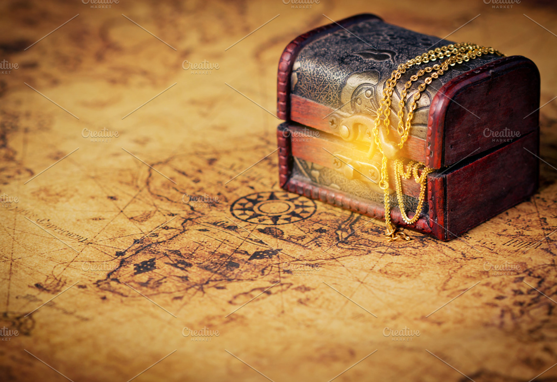 Treasure chest on old map featuring map, chest, and burned, an Abstract ...