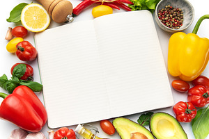 Open notebook with fresh cooking ingredients, a Food & Drink Photo by Olena Rudo