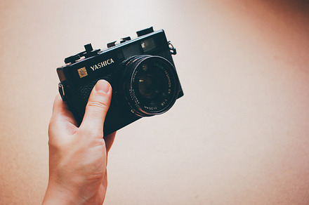Hand holding film camera stock photo containing film camera and film, an Arts & Entertainment Photo by Nuchylee Photo