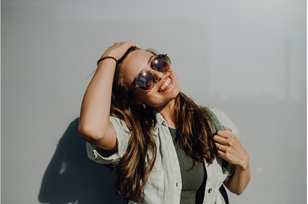 Portrait of happy young woman, a Person Photo by HalfPoint