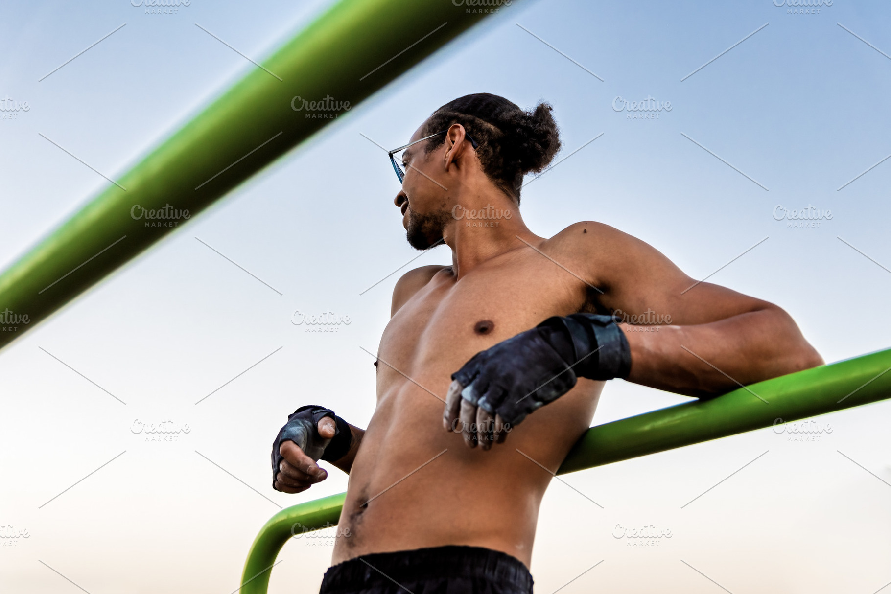 Athlete leaning against a calistheni, a Sports & Recreation Photo by Perpis