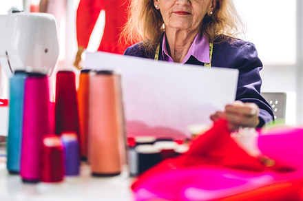 Portrait of elderly woman fashion designer stylish sitting and w, a Person Photo by Art_Photo