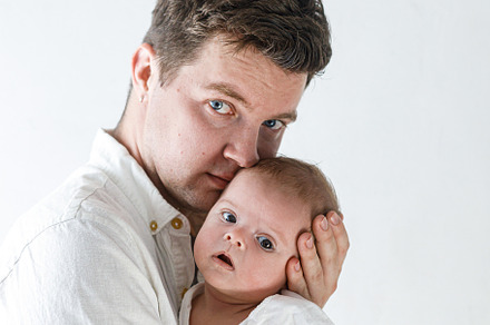 Happy Fathers day! Stylish father hugging little baby son close