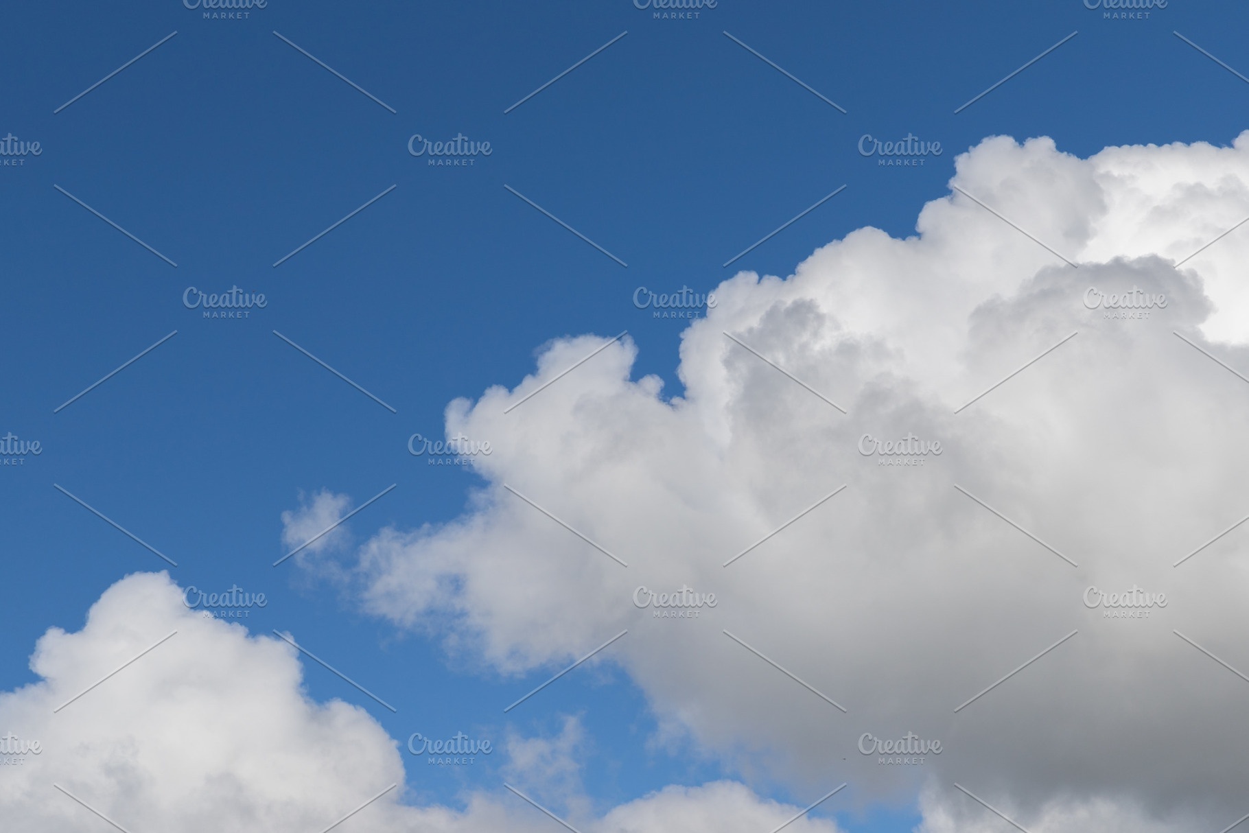 Blue sky with clouds featuring outdoor, air, and atmosphere, a Nature Photo by KYNA STUDIO