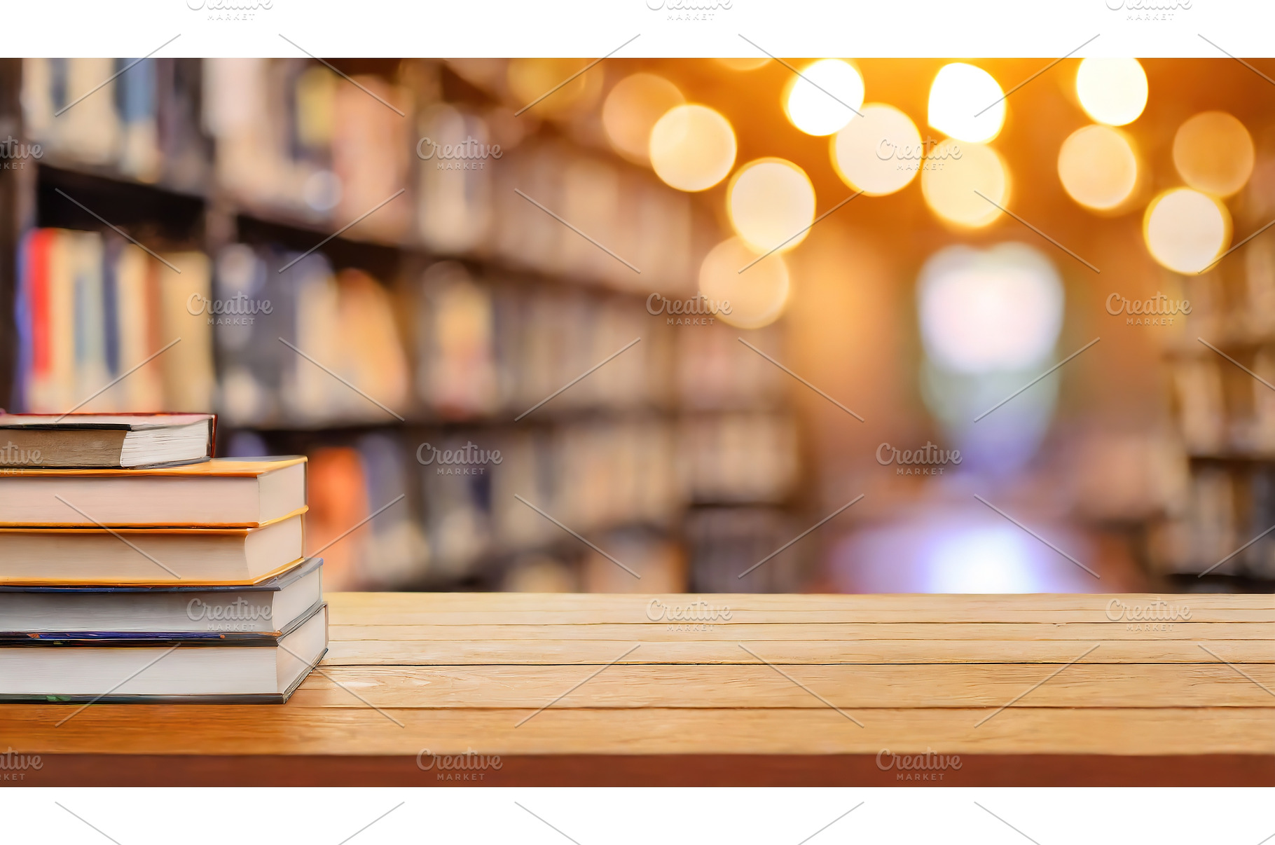 Stack of books on wooden table, a School & Education Photo by Igor Tichonow