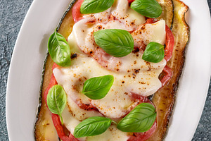 Grilled Zucchini With Tomato Torched Mozzarella Basil On Elegant, a Food & Drink Photo by Alexander Prokopenko