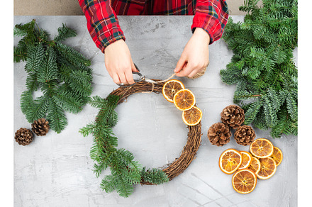 Decorating of Christmas wreath