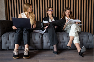 Businesswomen reviewing project data, a Business Photo by undrey