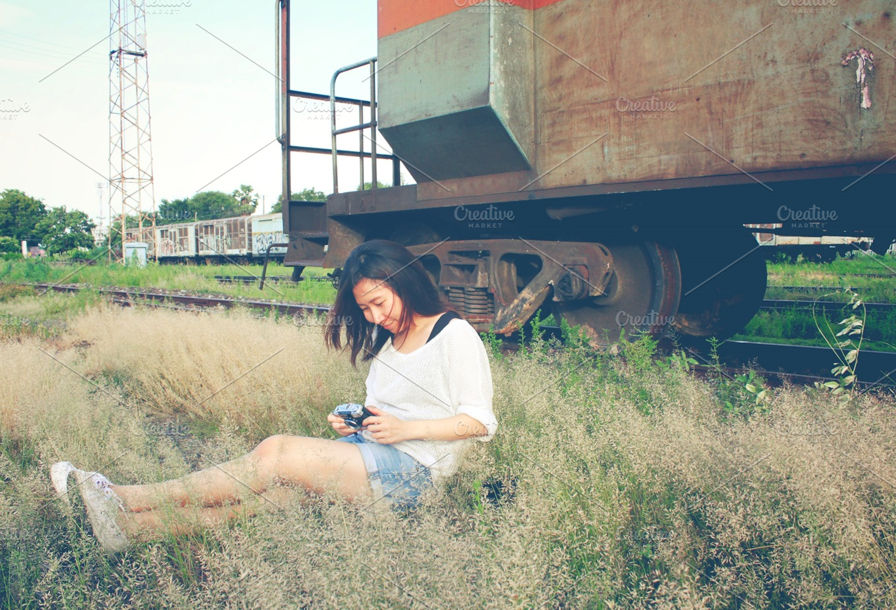 A traveler relaxing on grassland
