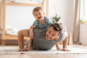 Father Playing Push-Ups with Happy Toddler, a Photo by Davizro's Market