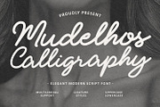 Mudelhos Calligraphy Script Font, a Script Font by Maulana Creative (Thumbnail 1 of 7)