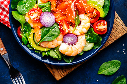 Fresh salad for keto diet with salmon, avocado, spinach, cucumbe, a Food & Drink Photo by 5PH