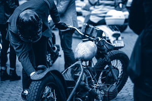 Gentleman starting his bike