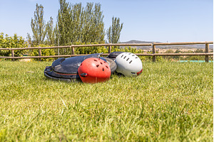 Electric unicycle with helmets lie, a Sports & Recreation Photo by Illustrations&photos