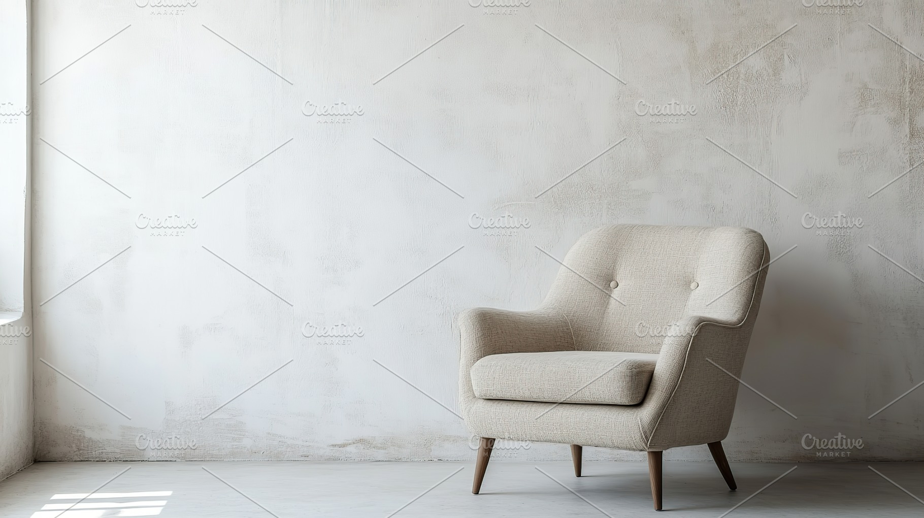 Soft armchair near blank wall with sun rays, a Photo by AlyaAnd
