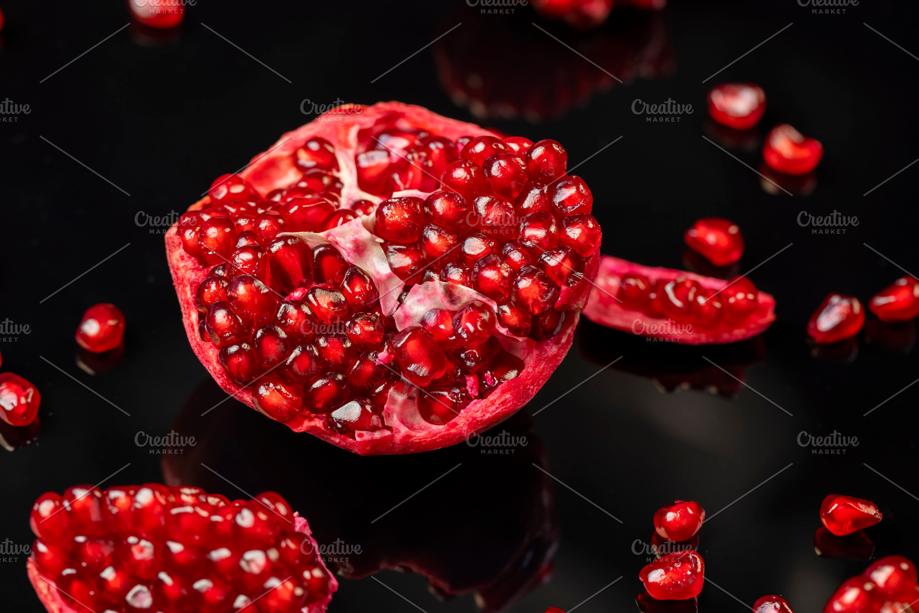 peeled ripe red pomegranate with juicy grains, closeup, a Photo by rsoollAI