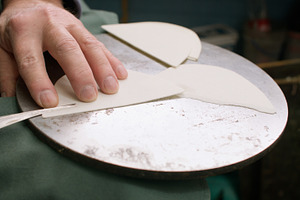 Professional artisan cobbler workplace material, a Person Photo by Photo Drive Studio