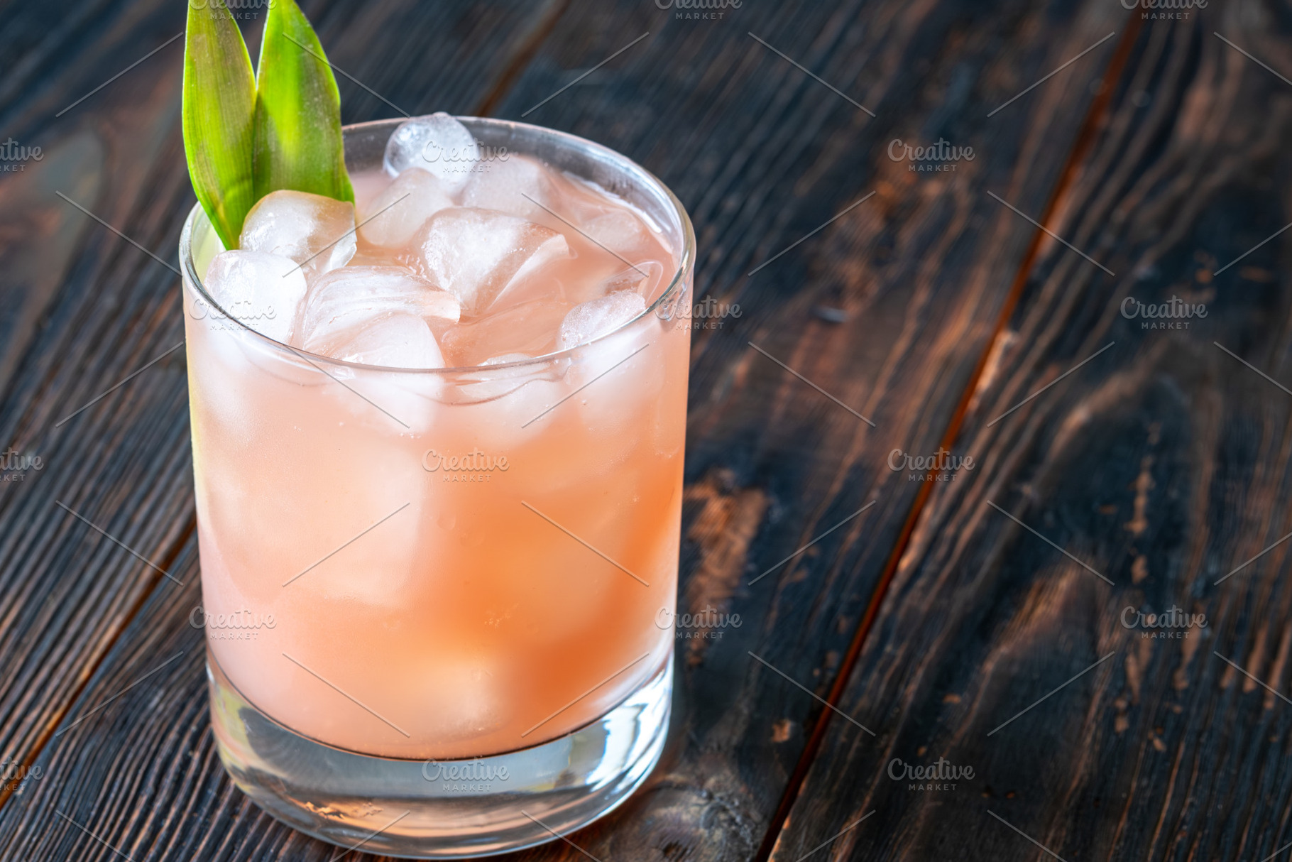 Guava rum punch cocktail with, a Food & Drink Photo by Alexander Prokopenko