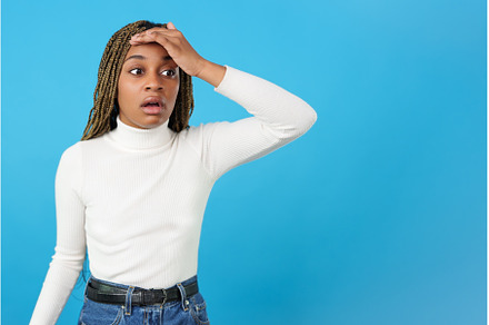 Forgetful african woman gesturing a, a Person Photo by Iván Moreno STOCK PHOTO