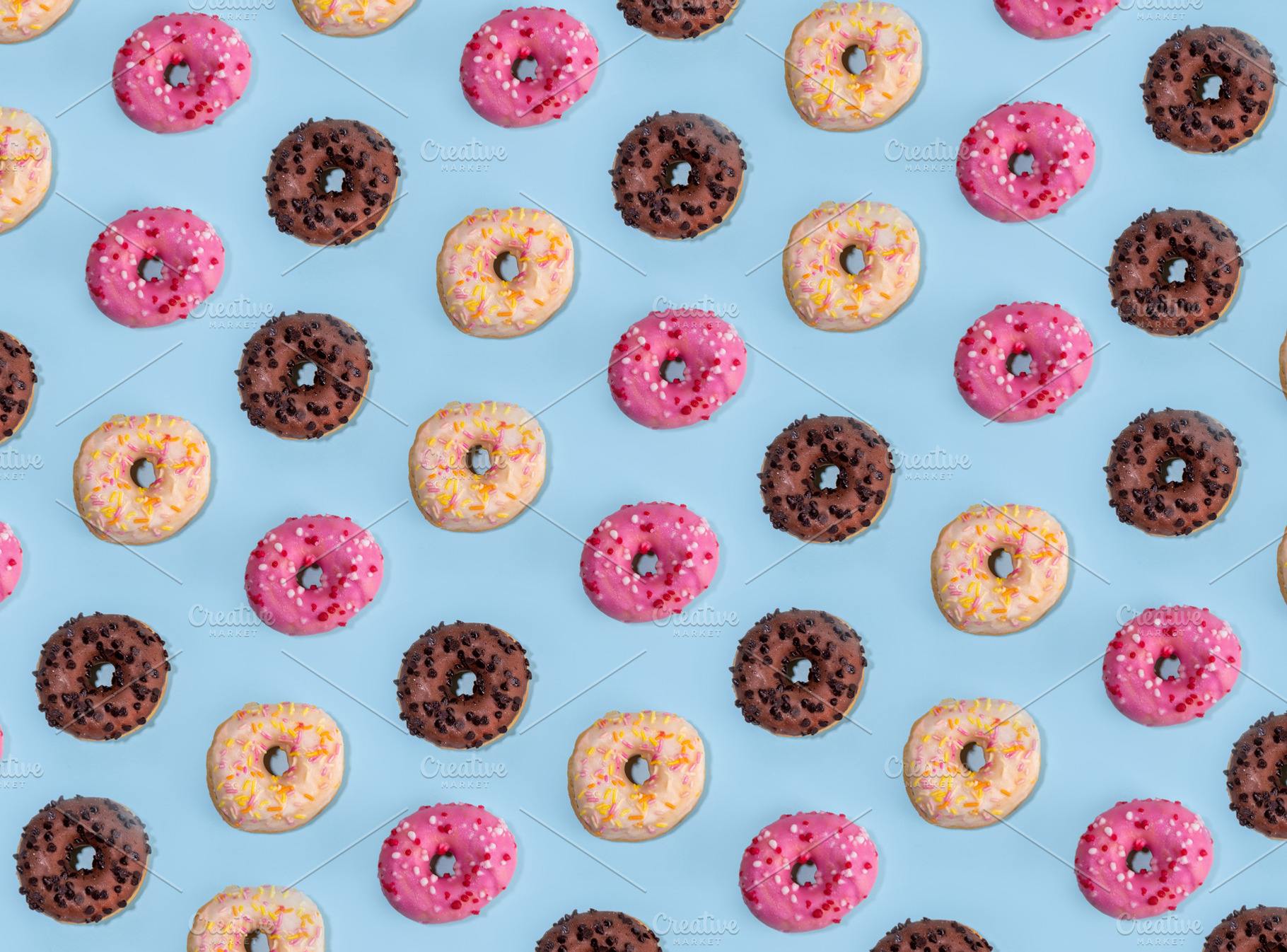 Sweet colorful sugar glazed donuts, a Food & Drink Photo by Rimma