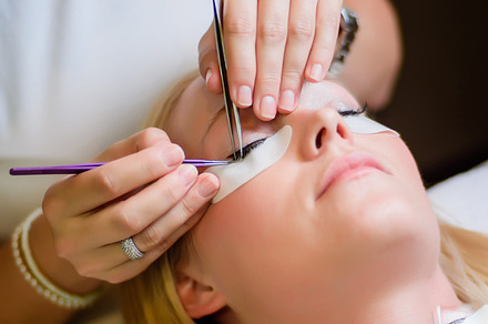 Eyelash extension procedure stock photo containing people and young