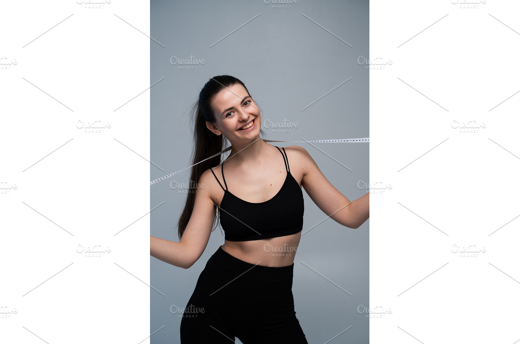 Young woman confidently holding a, a Sports & Recreation Photo by volodymyrshtun13795