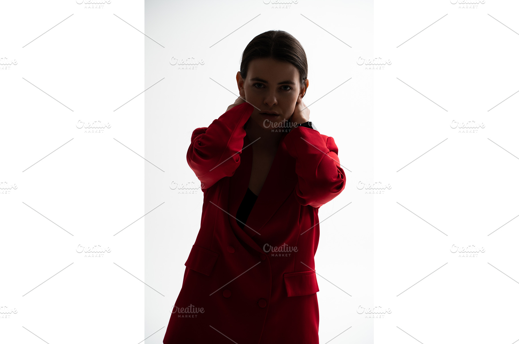 Woman posing in a red blazer, a Person Photo by volodymyrshtun13795