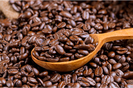 Wooden spoon of coffee beans and bag, a Food & Drink Photo by Ungvar Studio