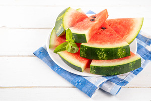 Slice of watermelon on plate, a Photo by Rimma