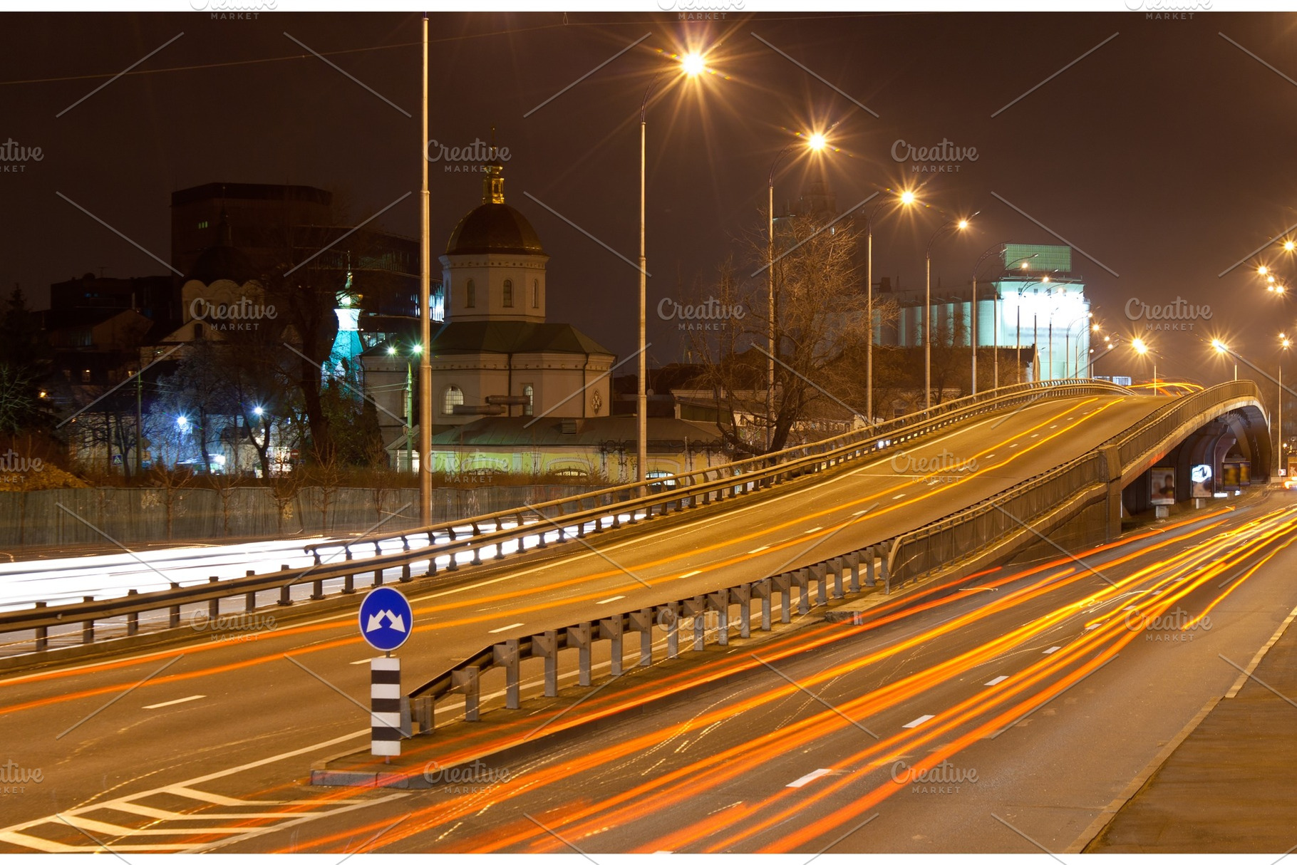 The bridge of a traffic interchange at night containing night, road, and, a Transportation Photo by Leonid Andronov
