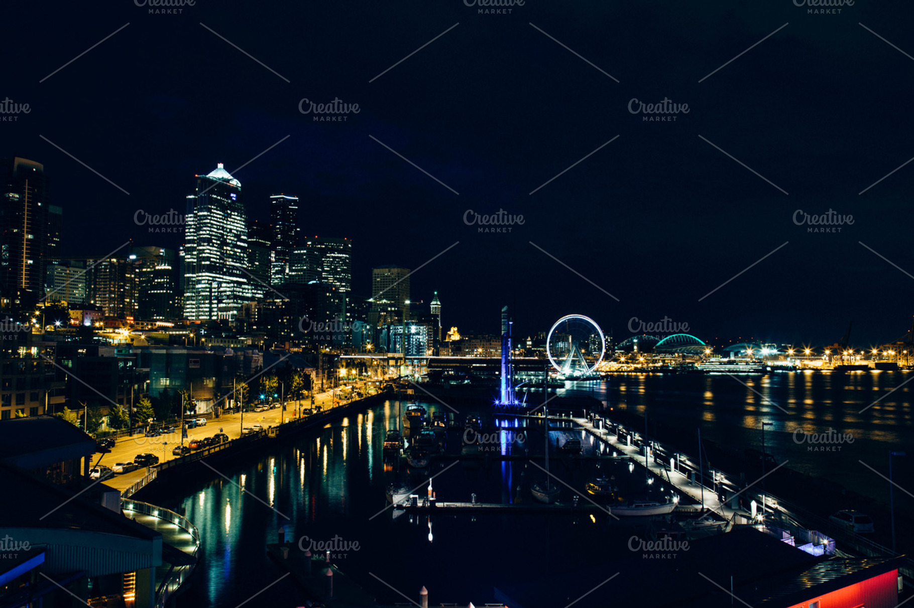 Seattle waterfront at night, an Architecture Photo by Hello Goodbye Studio