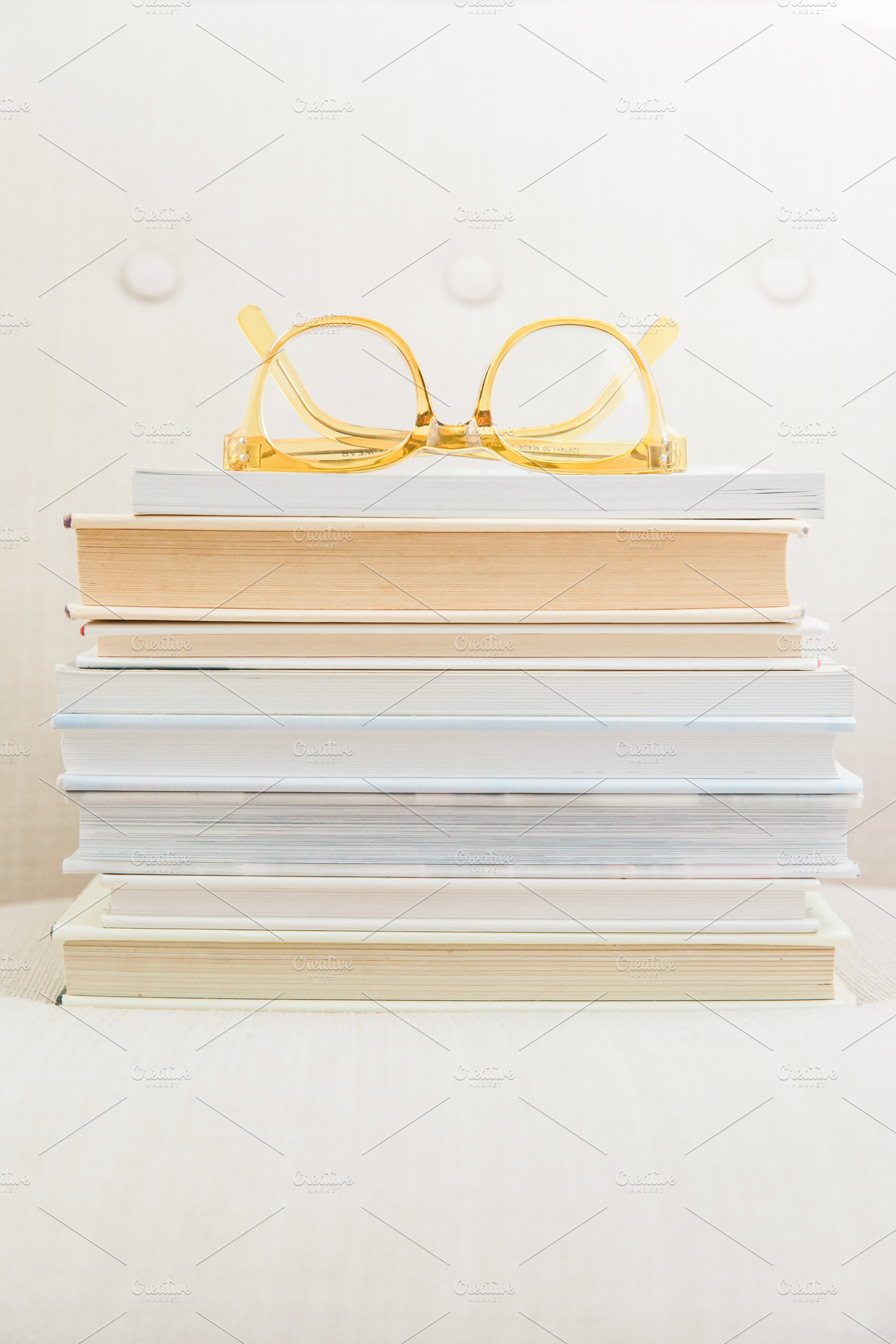 Books + Glasses Stock Image, a Photo by Fine Stock Art
